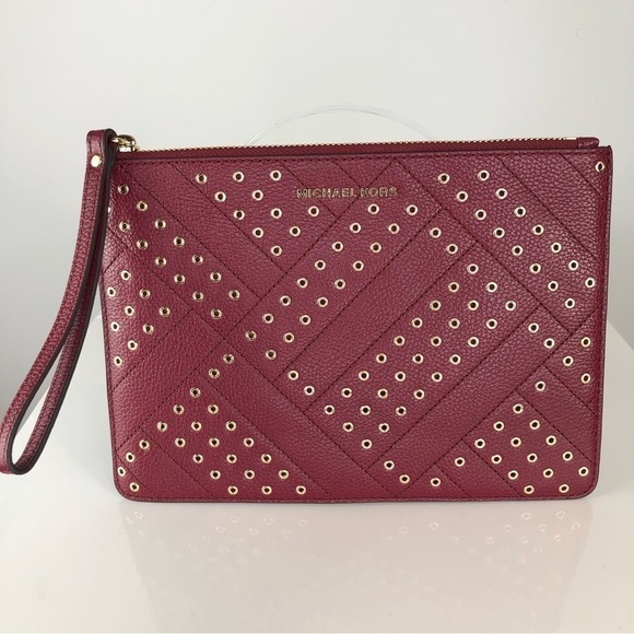 Michael Kors maroon red pebbles leather grommets Wristlet clutch bag - Picture 1 of 9